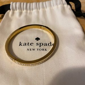 Kate Spade yellow gold tone hinge bangle